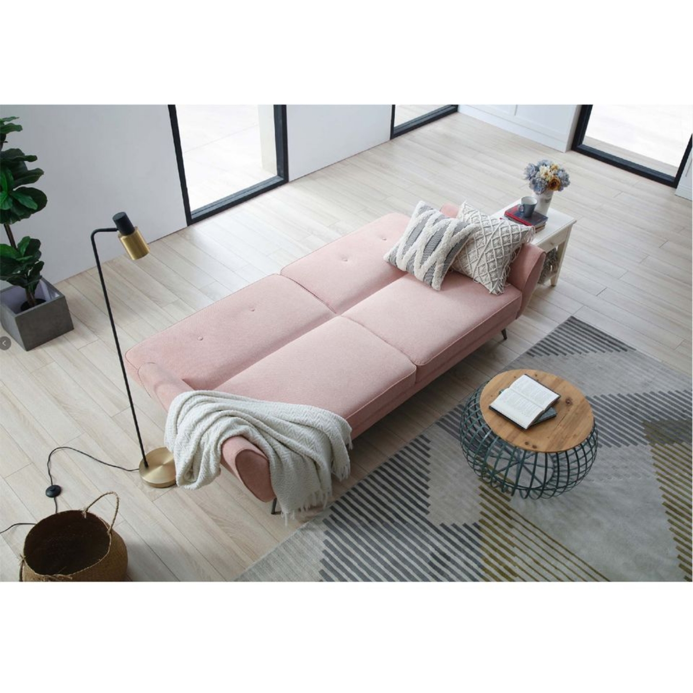 .This Eliane three-seater sofa bed is created in a contemporary design with metal legs that will make a strong style statement in any home. 